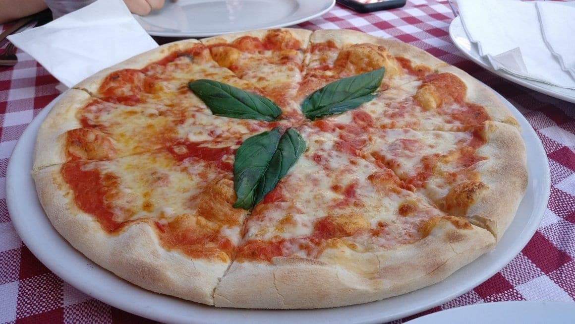 Pizza with basil